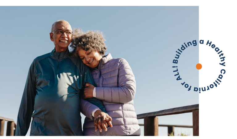 Building a healthy California for all. Senior couple walking on a pier.