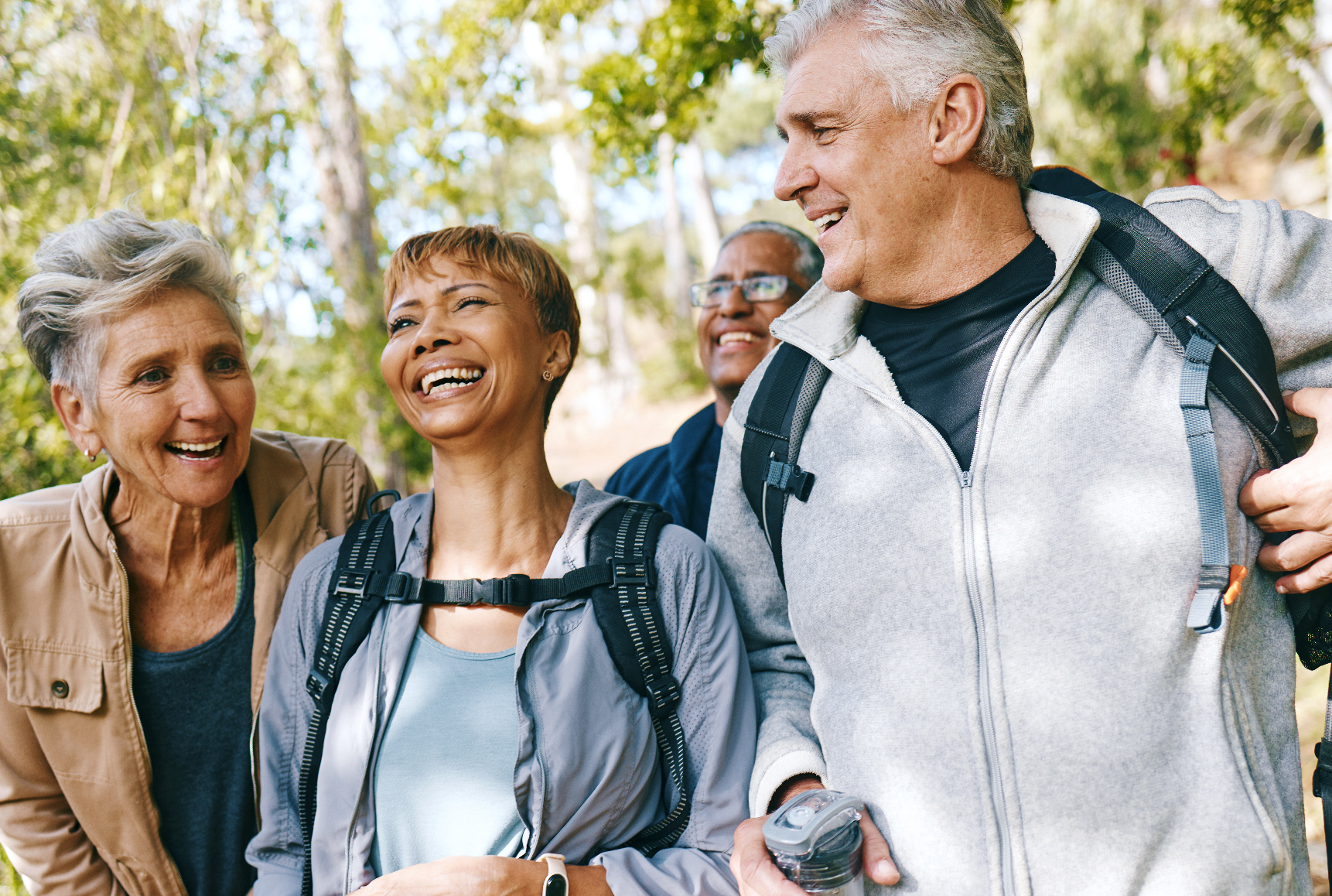 Selfie, nature and mature people hiking for fitness, health and wellness on mountain for travel. Happy, activity and senior friends with photography picture for memory on trekking trip or vacation.